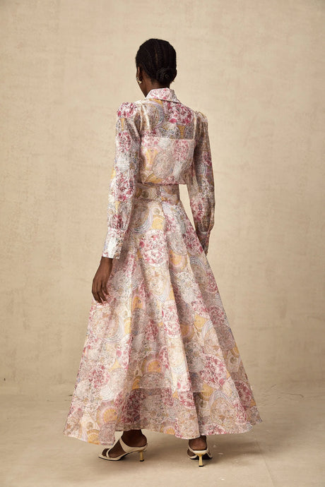 A pink shirt and skirt set with a cherry pattern print showcasing a matching outfit for women