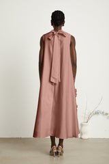 A pink sleeveless midi dress with floral applique details named Emilie