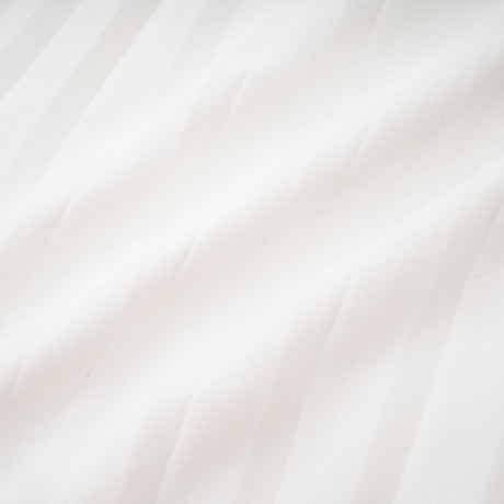 A plissiertes minikleid with v neck called Claudette featuring a pleated design and short length