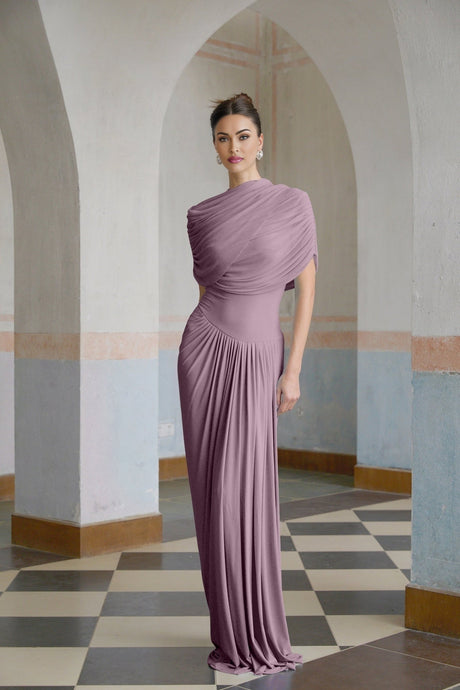 A purple asymmetric maxi dress with pleated details worn by a model standing against a plain background