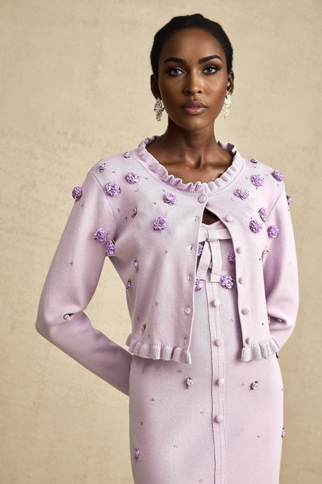 A purple knitted cardigan and dress set with faux flower decorations matching outfit for women
