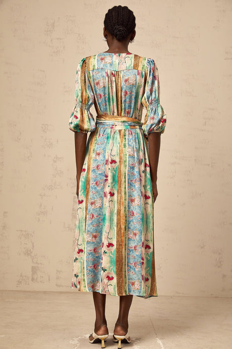 A red floral print wrap dress with a midi length skirt and short sleeves