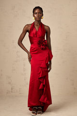 A red halterneck maxi dress featuring 3D petal ruffles and a flowing long skirt