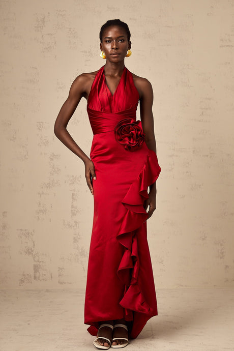A red halterneck maxi dress featuring 3D petal ruffles and a flowing long skirt