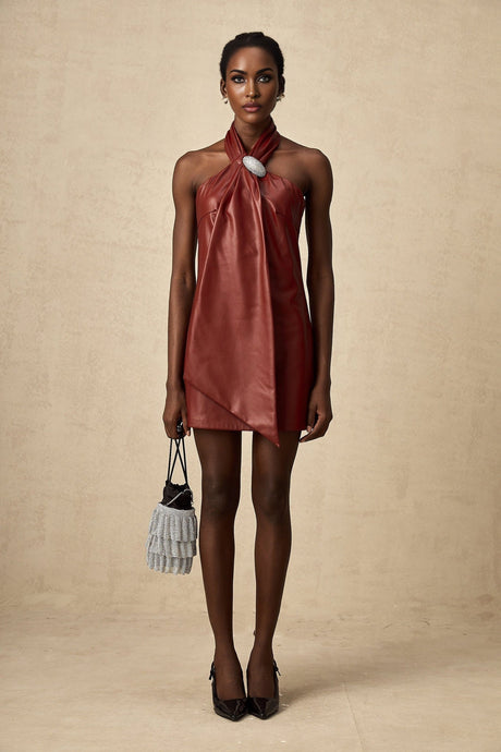 A red halterneck mini dress made of sheepskin with a slim fit and short hemline