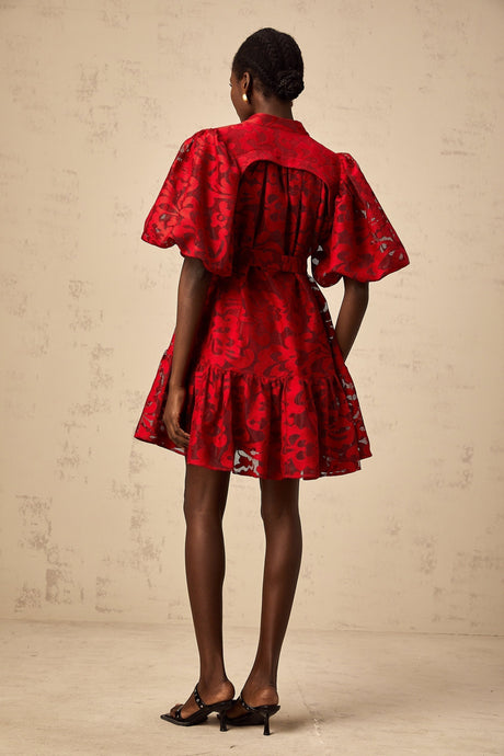 A red jacquard mini dress with a semi sheer design named Athenais