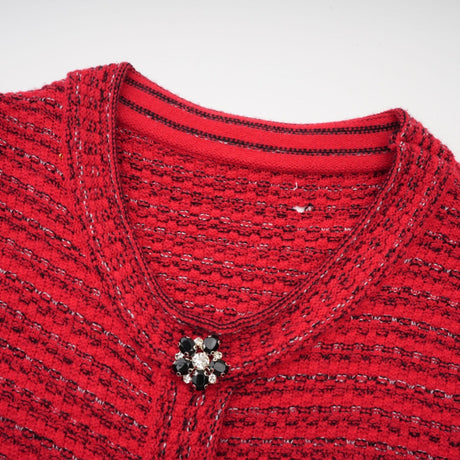 A red knit midi dress with embellishments named Faustine featuring a fitted silhouette and decorative details