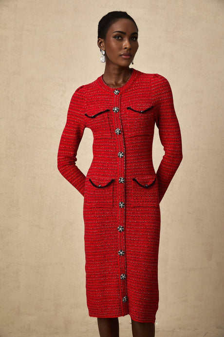 A red knitted midi dress with embellishments named Faustine featuring a fitted silhouette and decorative details on the fabric