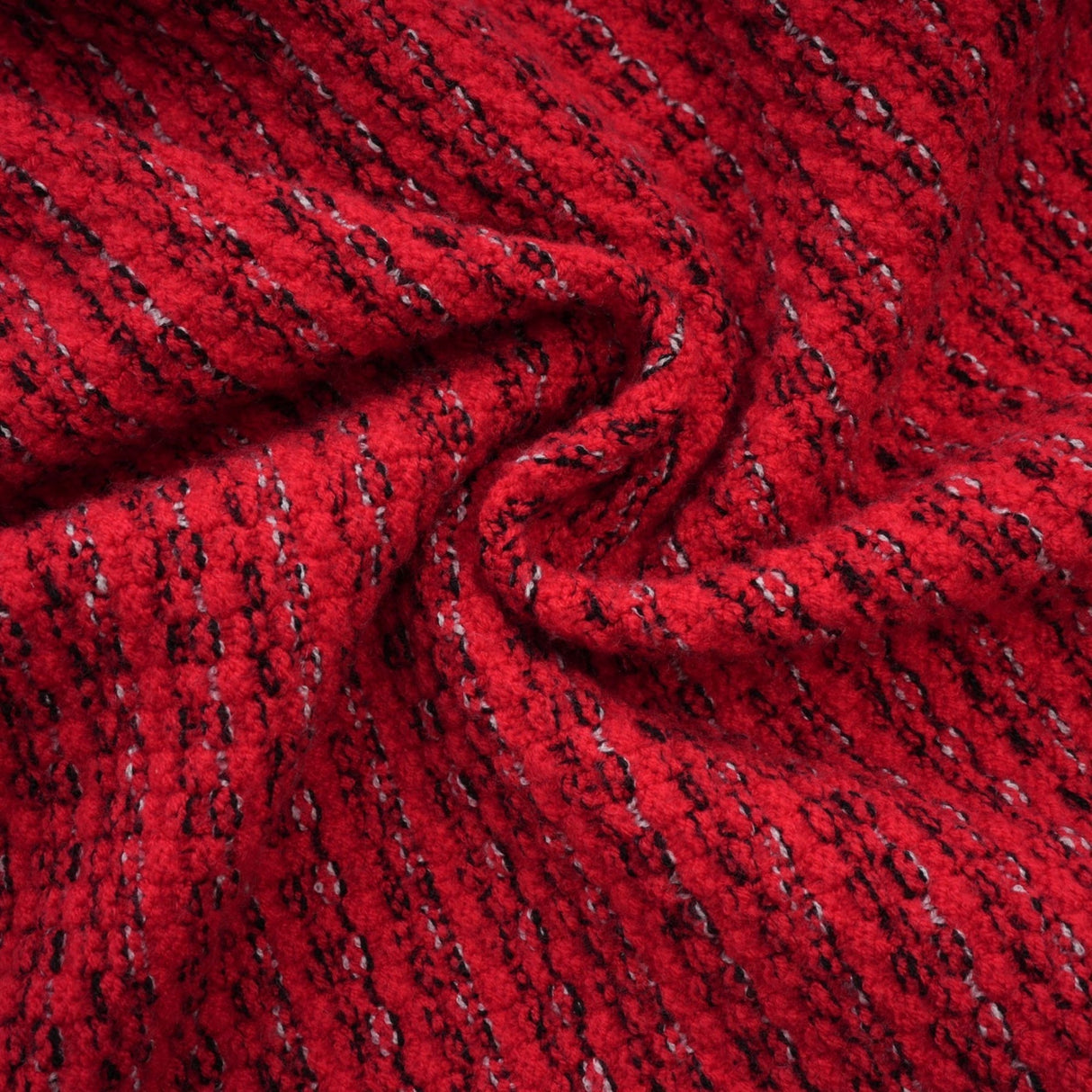 A red knitted midi dress with embellishments named Faustine featuring a fitted silhouette and decorative details