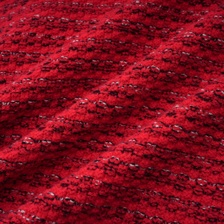 A red knitted midi dress with embellishments named Faustine featuring a fitted silhouette and intricate decorative details