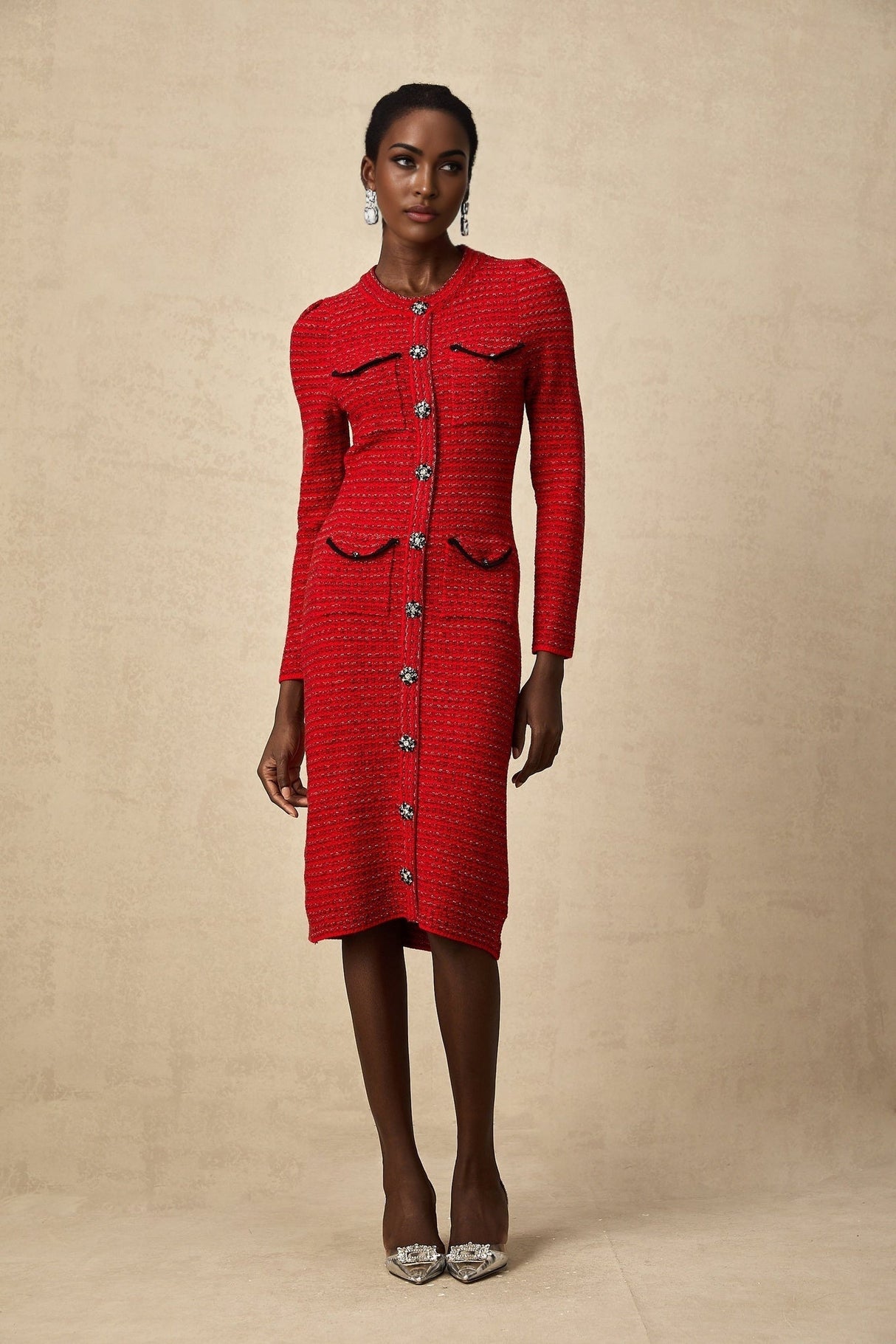 A red knitted midi dress with embellishments named Faustine featuring a form fitting silhouette