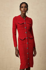 A red knitted midi dress with embellishments named Faustine on a plain background