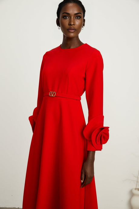 A red long sleeve dress with floral pattern called Aurelia