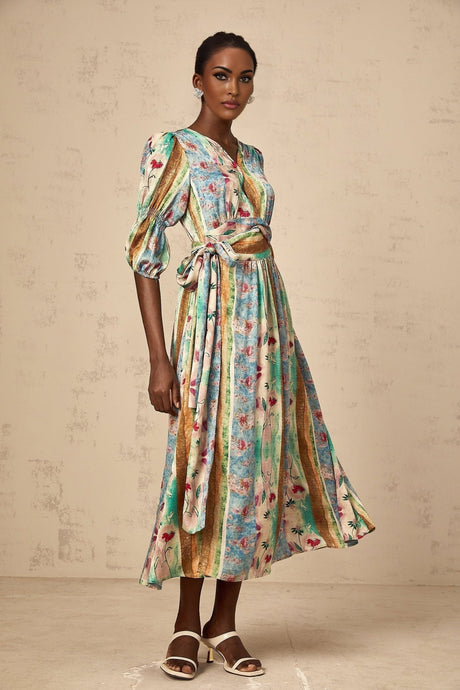 A red midi dress with a floral print pattern and wrap style design