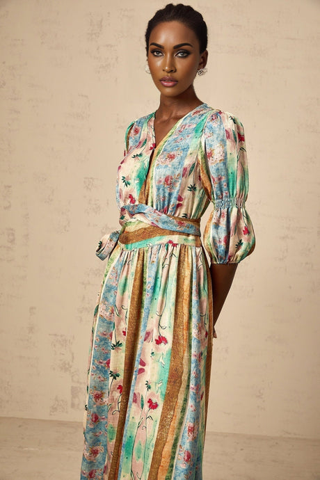 A red midi dress with a floral print pattern and wrap style design