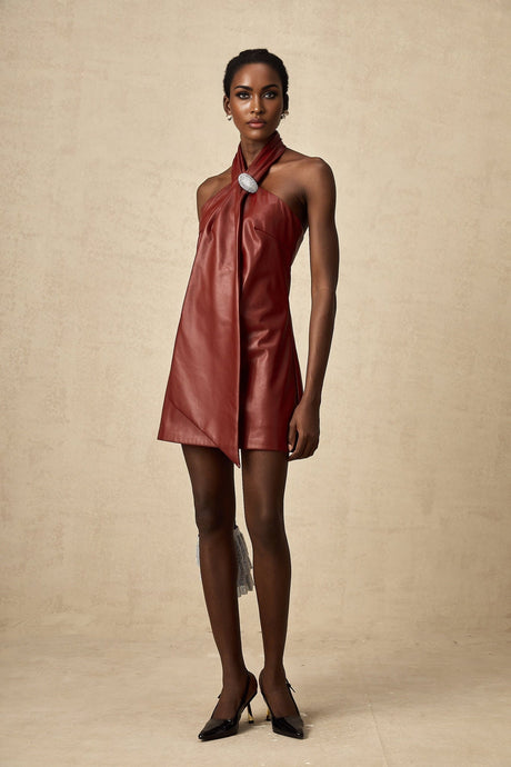 A red mini dress made of sheepskin with a halterneck design called Maxanne