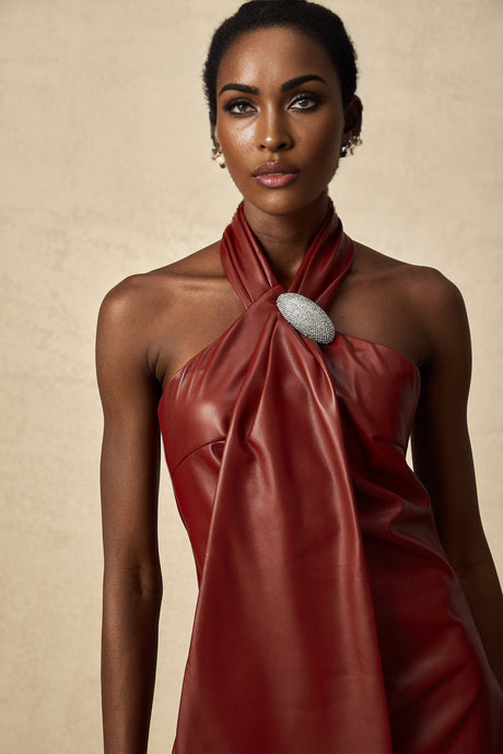 A red mini dress made of sheepskin with a halterneck design featuring the Maxanne brand