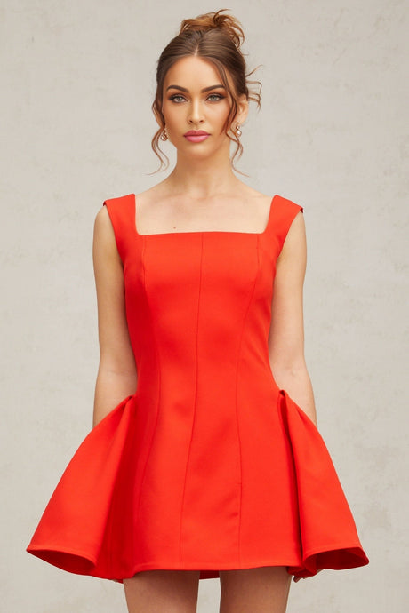 A red mini dress with a square neckline and puff sleeves in a Margherita style