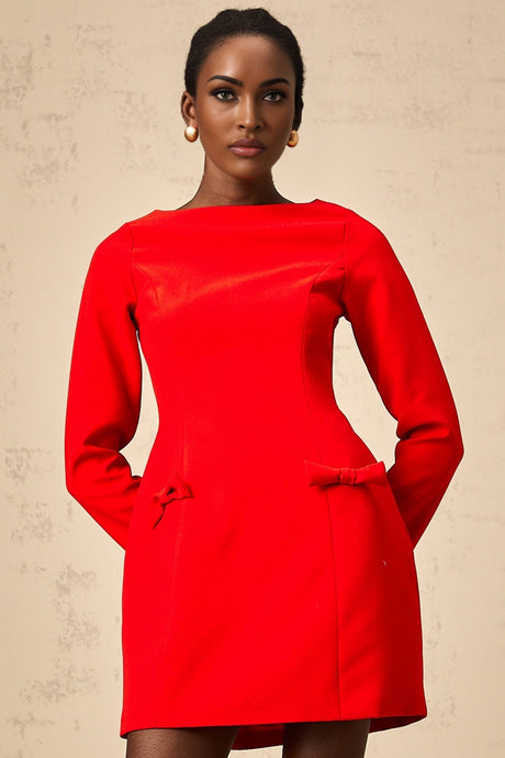 A red mini dress with long sleeves and a decorative bow detail at the neckline named Magali