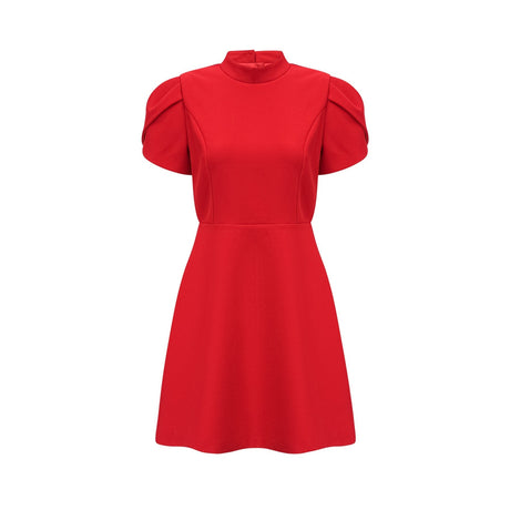 A red mini dress with petal sleeves and a cutout design featuring a bow detail