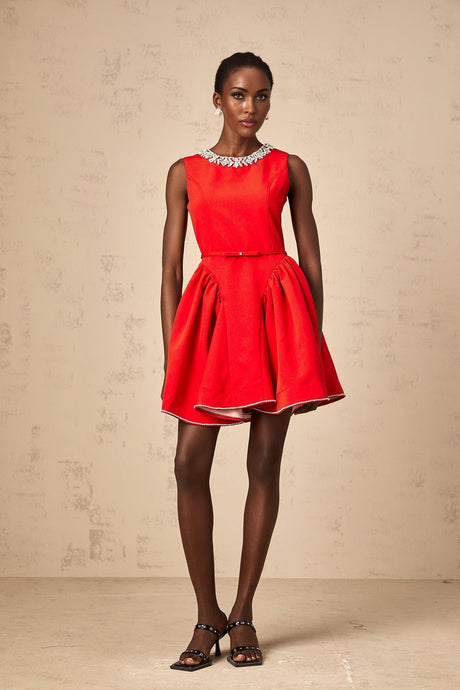 A red mini dress with pleated details and embellishments named Leonie