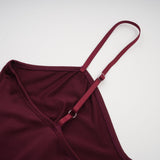 A red oversize dress made of chantilly lace with a loose fit and delicate floral pattern