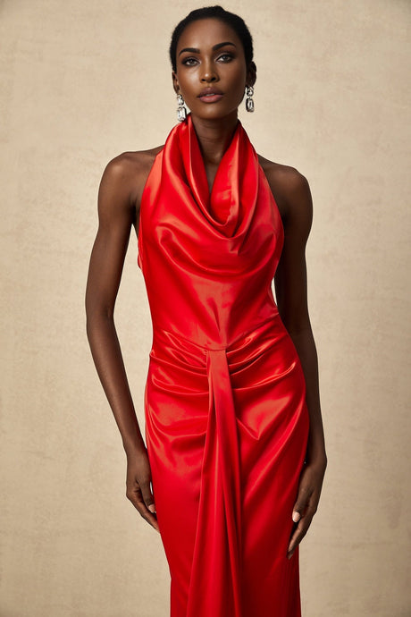 A red satin maxi dress with a halter neckline and draped design featuring the Alix brand