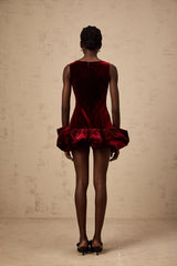 A red velvet mini dress with a peplum hem named Marion