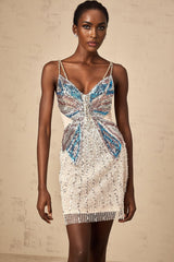 A short beaded mini dress with butterfly motifs covering the fabric in a shimmering pattern elegant and whimsical design perfect for special occasions