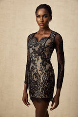 A short black mini dress with delicate floral embroidery in lace fabric showcasing a feminine and elegant design