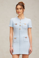 A short blue knit mini dress with crystal embellishments named Cindy