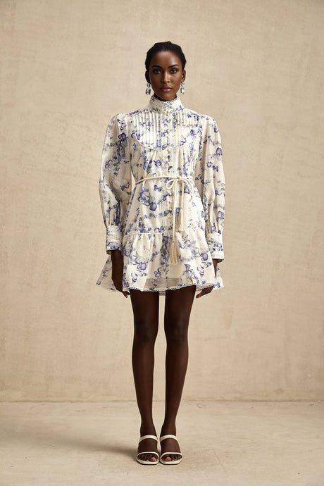 A short flared chiffon mini dress with a colorful floral print pattern called Blandine