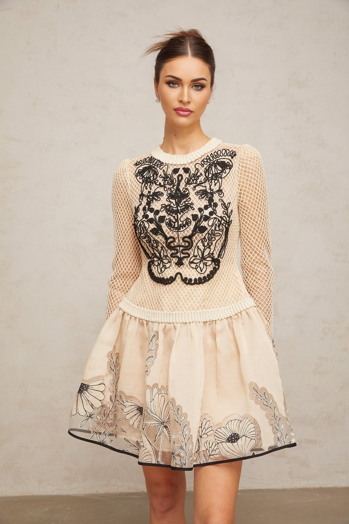 A short floral jacquard mini dress with contrasting color floral appliques featuring a design named Wilhelmine