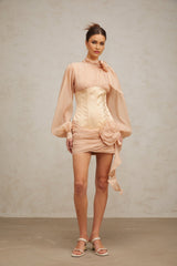 A short floral mini dress with cinched waist and applique details featuring panels and a fitted silhouette