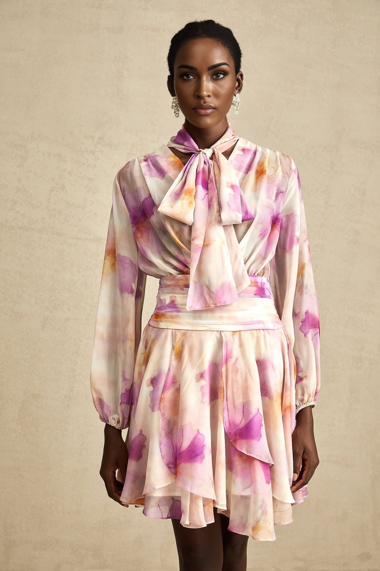 A short floral print dress with a V neckline and mini length from the brand Maelys