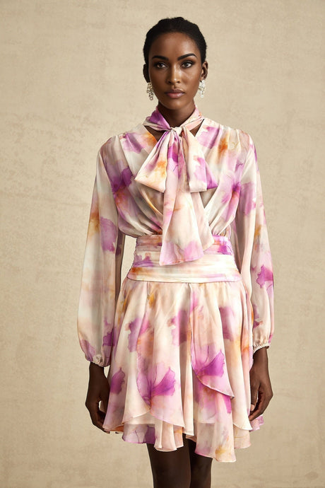 A short floral print dress with a V neckline and mini length from the brand Maelys