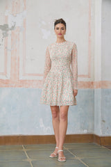 A short floral print dress with pleats and a mini length called Marion