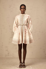 A short floral print mini dress with a belt around the waist featuring a vibrant pattern and a fitted silhouette