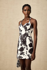A short floral print mini dress with a halter neckline called Gabrielle