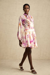 A short floral print mini dress with a V neckline in the Maelys style