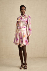 A short floral print mini dress with a V neckline in the Maelys style