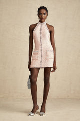 A short halterneck mini dress with crystal embellishments called Louise
