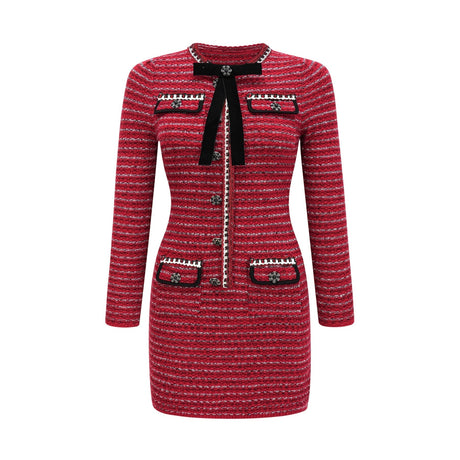 A short knit mini dress with a bow detail named Faustine