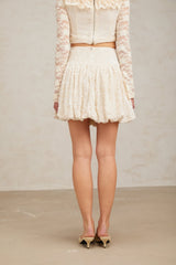 A short pleated mini skirt with sequin embellishment named Tiphaine