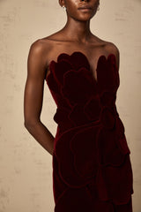 A short red velvet dress with floral appliques featuring a mini length design by Maiwenn