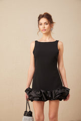 A short ruffled mini dress with an open back design named Loujain