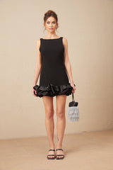 A short ruffled mini dress with an open back design named Loujain