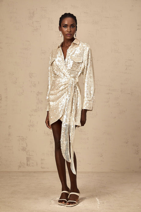 A short sequined mini dress with a wrap design and shirt collar in a shimmering aurore color