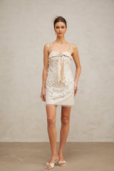 A short shimmering mini dress adorned with sequins featuring a sleek silhouette and likely a vibrant or metallic color perfect for special occasions or evening events