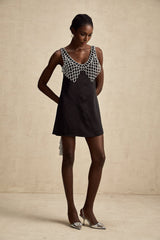 A short sleek satin mini dress with crystal embellishments named Leonore